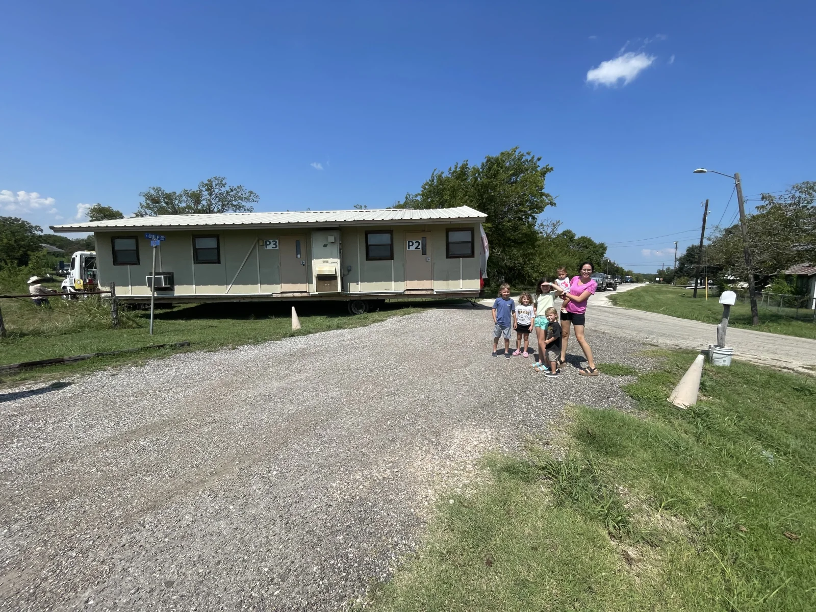 Portable classroom relocated through a Texas neighborhood